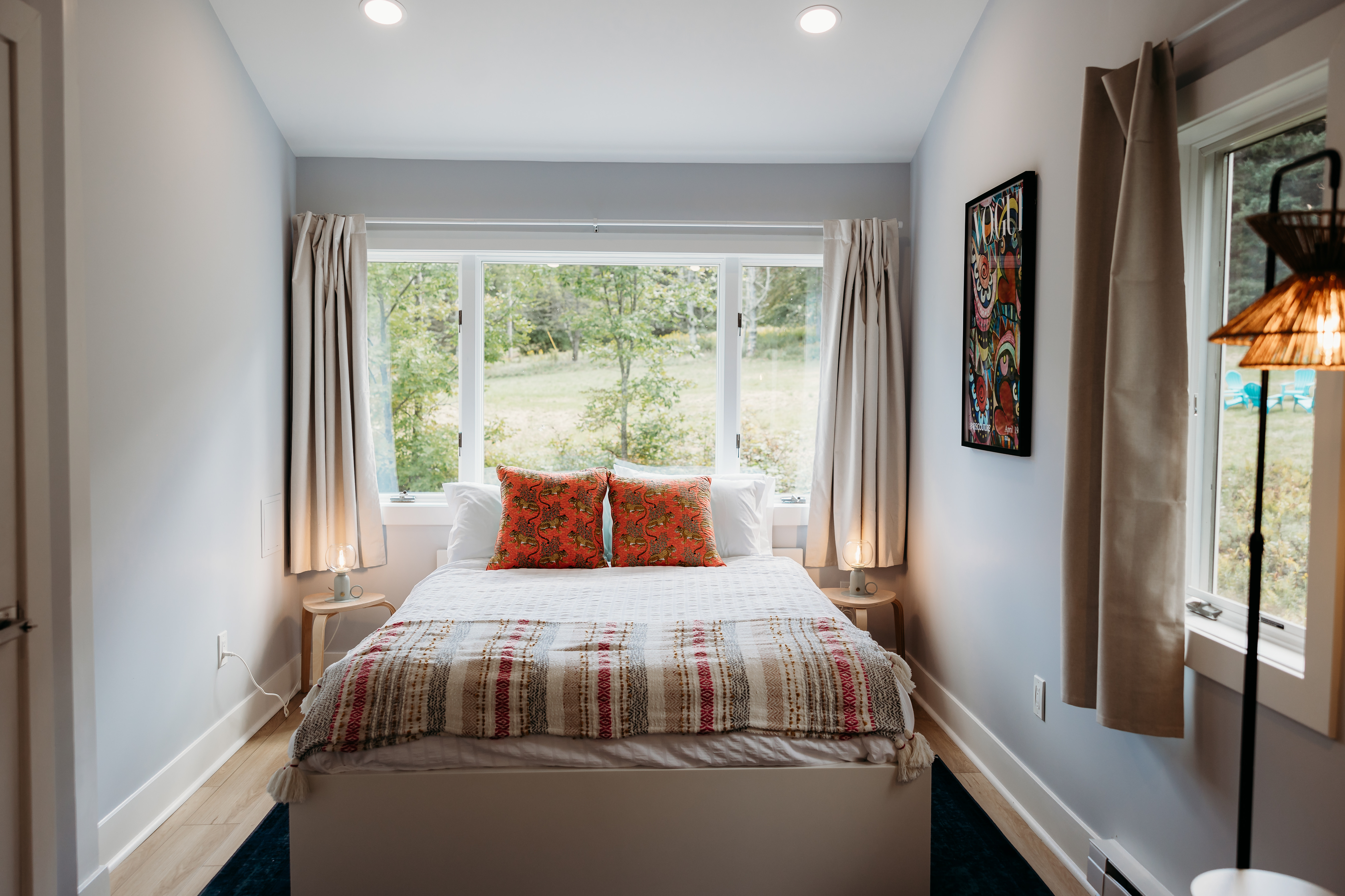 Bedroom with green view through window