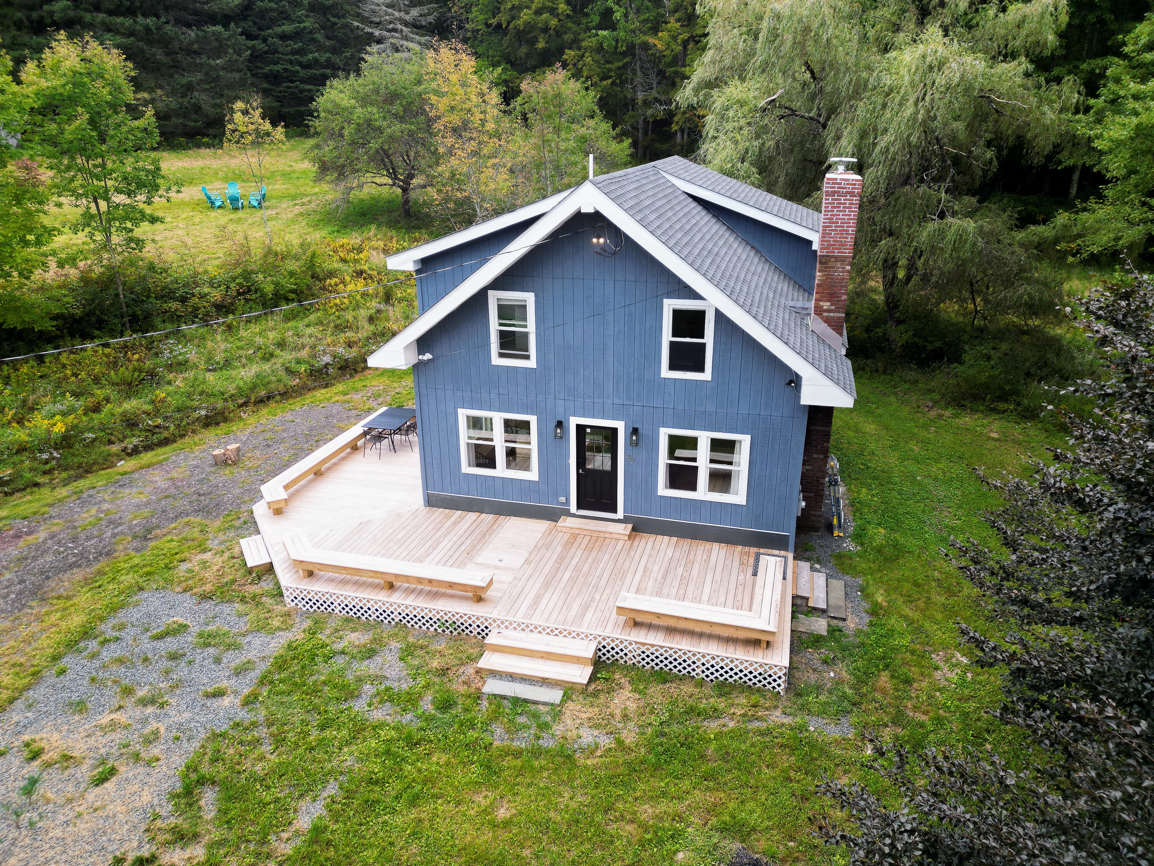 Peek-a-Blue cabin from above, blue house with wraparound deck